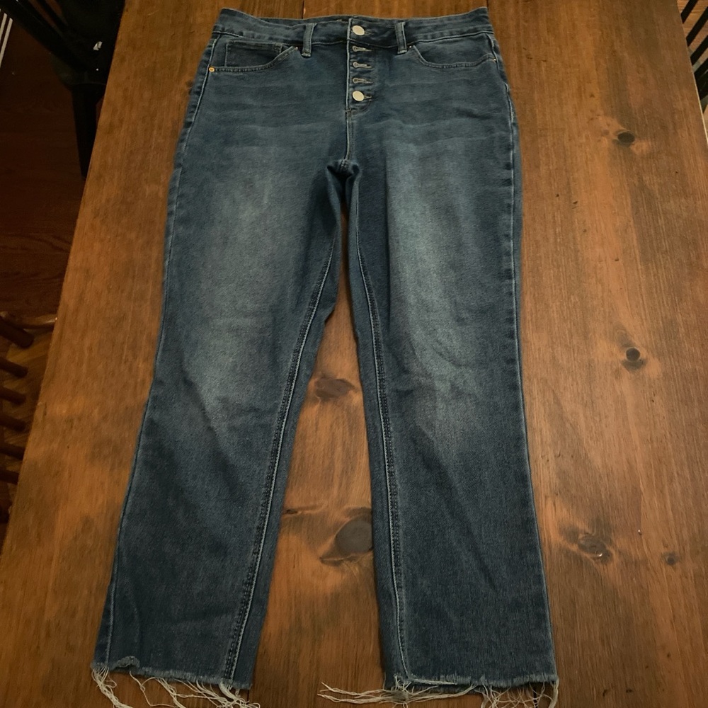Dark-wash distressed skinny jeans